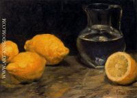 Limones y jarra de agua