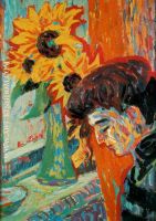 Head of a woman in front of sunflowers