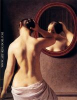 Woman Standing In Front Of A Mirror
